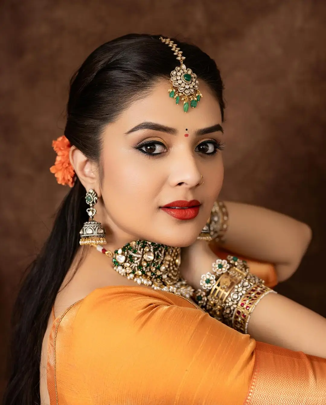 ETV Actress Sreemukhi in Orange Lehenga Blue Choli